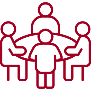 Team focusing on important tasks other than logistics icon team around boardroom table