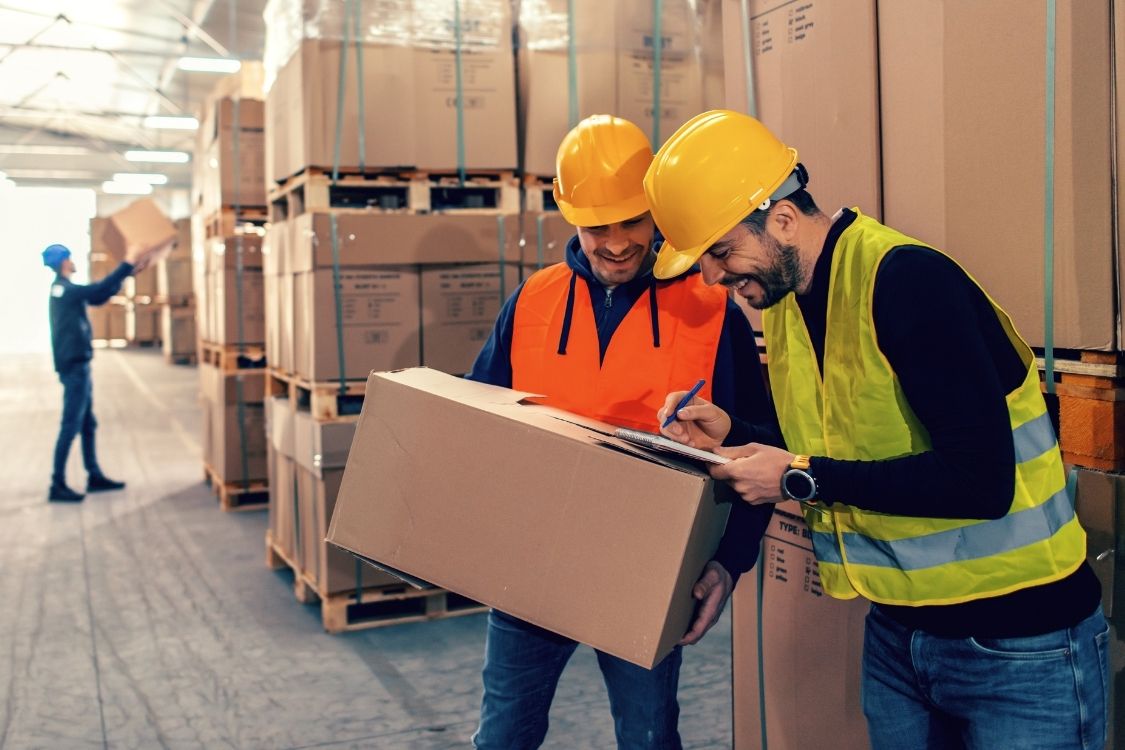 3pl logistics offering Flexible Retail Warehouse Services - warehouse team members manual handling retail packages for fulfilment (2)